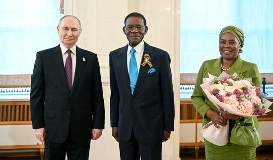 President of Russia Vladimir Putin and President of the Republic of Equatorial Guinea Teodoro Obiang Nguema Mbasogo, who arrived in the Kremlin for a gala concert for heads of foreign delegations attending the 80th anniversary of Victory in the Great Patriotic War. Location: Russia, Moscow. Author: Sergey Bobylev/Sputnik. Heads of foreign delegations arrive in Kremlin for gala concert