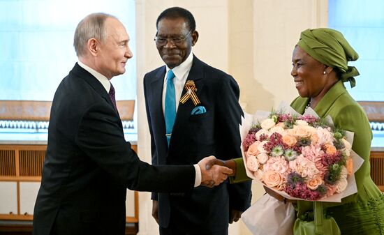 President of Russia Vladimir Putin and President of the Republic of Equatorial Guinea Teodoro Obiang Nguema Mbasogo, who arrived in the Kremlin for a gala concert for heads of foreign delegations attending the 80th anniversary of Victory in the Great Patriotic War. Location: Russia, Moscow. Author: Sergey Bobylev/Sputnik. Heads of foreign delegations arrive in Kremlin for gala concert