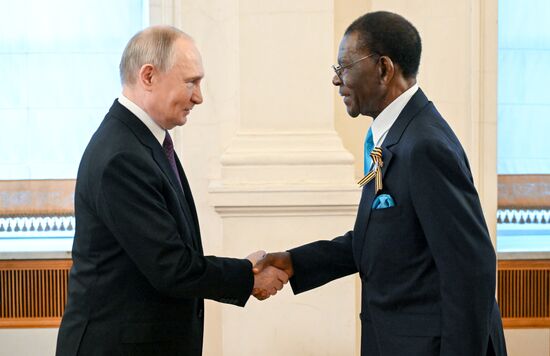 President of Russia Vladimir Putin and President of the Republic of Equatorial Guinea Teodoro Obiang Nguema Mbasogo, who arrived in the Kremlin for a gala concert for heads of foreign delegations attending the 80th anniversary of Victory in the Great Patriotic War. Location: Russia, Moscow. Author: Sergey Bobylev/Sputnik. Heads of foreign delegations arrive in Kremlin for gala concert