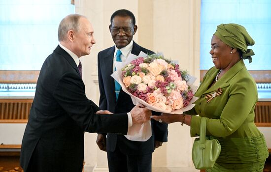 President of Russia Vladimir Putin and President of the Republic of Equatorial Guinea Teodoro Obiang Nguema Mbasogo, who arrived in the Kremlin for a gala concert for heads of foreign delegations attending the 80th anniversary of Victory in the Great Patriotic War. Location: Russia, Moscow. Author: Sergey Bobylev/Sputnik. Heads of foreign delegations arrive in Kremlin for gala concert