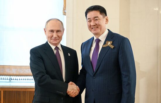 President of Russia Vladimir Putin and President of Mongolia Ukhnaagiin Khurelsukh, who arrived in the Kremlin for a gala concert held for heads of foreign delegations invited to the celebrations of the 80th anniversary of Victory in the Great Patriotic War. Location: Russia, Moscow. Author: Sergey Bobylev/Sputnik. Heads of foreign delegations arrive in Kremlin for gala concert