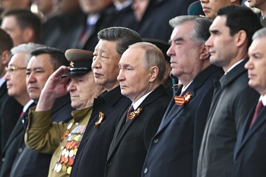 President of Russia Vladimir Putin on Red Square in Moscow, where a military parade marking the 80th anniversary of Victory is taking place. Russia marks the 80th anniversary of Victory in the Great Patriotic War of 1941-1945. Location: Russia, Moscow. Author: Sergey Bobylev/Sputnik. President of Russia Vladimir Putin and foreign leaders at military parade marking 80th anniversary of Victory
