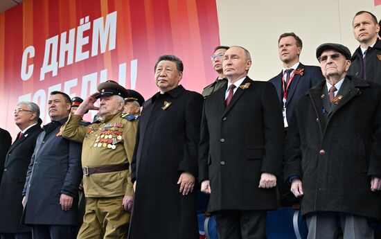 Russian President Vladimir Putin and Chinese President Xi Jinping at the military parade to mark the 80th anniversary of Victory. On May 9, Russia celebrates the 80th anniversary of Victory in the Great Patriotic War of 1941-1945. From left: President of Kazakhstan Kassym-Jomart Tokayev, President of Kyrgyzstan Sadyr Japarov and WWII veteran Yevgeny Znamensky. Right: WWII veteran Ivan Martynushkin. Location: Russia, Moscow. President of Russia Vladimir Putin and foreign leaders at military parade marking 80th anniversary of Victory