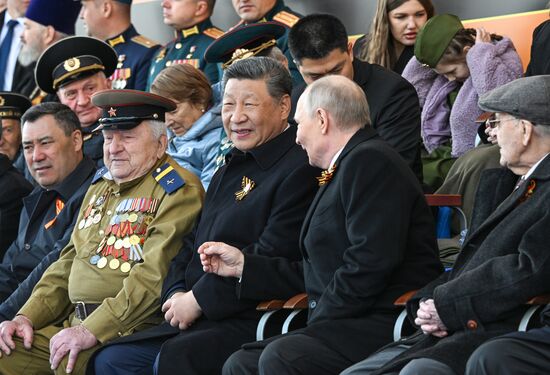 President of Russia Vladimir Putin and President of China Xi Jinping, center left, on Red Square in Moscow, where a military parade marking the 80th anniversary of Victory is taking place. Russia marks the 80th anniversary of Victory in the Great Patriotic War of 1941-1945. Location: Russia, Moscow. Author: Sergey Bobylev/Sputnik. President of Russia Vladimir Putin and foreign leaders at military parade marking 80th anniversary of Victory