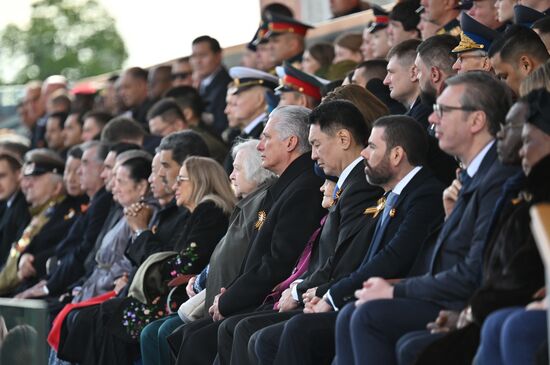 Guests on the stand on Red Square in Moscow at the military parade to mark the 80th anniversary of Victory. On May 9, Russia celebrates the 80th anniversary of Victory in the Great Patriotic War of 1941-1945. Center: Cuban President Miguel Diaz-Canel. Location: Russia, Moscow. Author: Ilya Pitalev/Sputnik. President of Russia Vladimir Putin and foreign leaders at military parade marking 80th anniversary of Victory