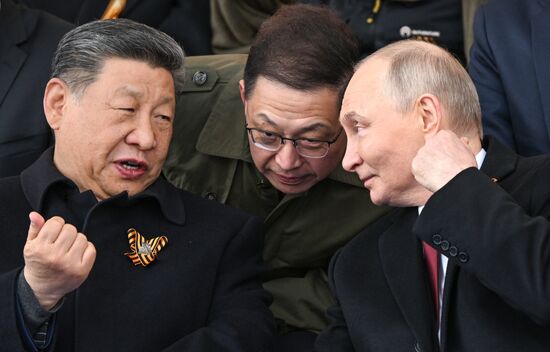 Russian President Vladimir Putin and Chinese President Xi Jinping, left, on Red Square in Moscow at the military parade to mark the 80th anniversary of Victory. On May 9, Russia celebrates the 80th anniversary of Victory in the Great Patriotic War of 1941-1945. Location: Russia, Moscow. Author: Sergey Bobylev/Sputnik. President of Russia Vladimir Putin and foreign leaders at military parade marking 80th anniversary of Victory