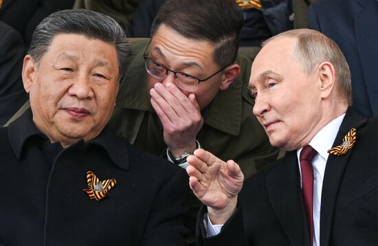 Russian President Vladimir Putin and Chinese President Xi Jinping, left, on Red Square in Moscow at the military parade to mark the 80th anniversary of Victory. On May 9, Russia celebrates the 80th anniversary of Victory in the Great Patriotic War of 1941-1945. Location: Russia, Moscow. Author: Sergey Bobylev/Sputnik. President of Russia Vladimir Putin and foreign leaders at military parade marking 80th anniversary of Victory
