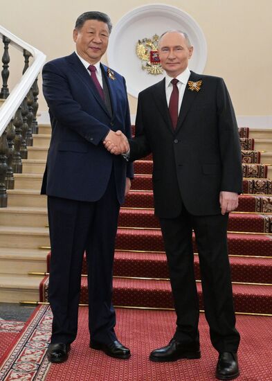 Russian President Vladimir Putin and Chinese President Xi Jinping, left, during a meeting at the Kremlin ahead of the military parade to mark the 80th anniversary of Victory. On May 9, Russia celebrates the 80th anniversary of Victory in the Great Patriotic War of 1941-1945. Location: Russia, Moscow. Author: Alexey Nikolskiy/Sputnik. President of Russia Vladimir Putin's meeting with foreign leaders