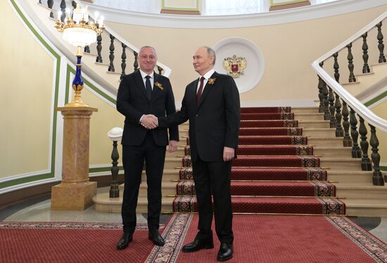 Russian President Vladimir Putin and Abkhazian President Badra Gunba, left, during a meeting at the Kremlin ahead of the military parade to mark the 80th anniversary of Victory. On May 9, Russia celebrates the 80th anniversary of Victory in the Great Patriotic War of 1941-1945. Location: Russia, Moscow. Author: Alexey Nikolskiy/Sputnik. President of Russia Vladimir Putin's meeting with foreign leaders