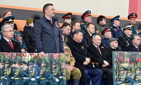 President of Russia Vladimir Putin, President of Kazakhstan Kassym-Jomart Tokayev, left, President of Kyrgyzstan Sadyr Japarov, second left, and Chinese President Xi Jinping, center, on Red Square in Moscow during the military parade to mark the 80th anniversary of Victory. On May 9, Russia celebrates the 80th anniversary of Victory in the Great Patriotic War of 1941-1945. Location: Russia, Moscow. Author: Sergey Bobylev/Sputnik. President of Russia Vladimir Putin and foreign leaders at military parade marking 80th anniversary of Victory