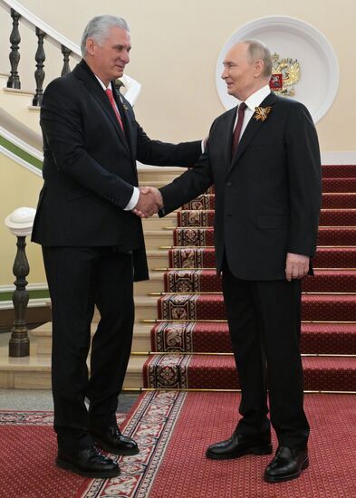 Russian President Vladimir Putin and Cuban President Miguel Diaz-Canel, left, during a meeting at the Kremlin ahead of the military parade to mark the 80th anniversary of Victory. On May 9, Russia celebrates the 80th anniversary of Victory in the Great Patriotic War of 1941-1945. Location: Russia, Moscow. Author: Alexey Nikolskiy/Sputnik. President of Russia Vladimir Putin's meeting with foreign leaders
