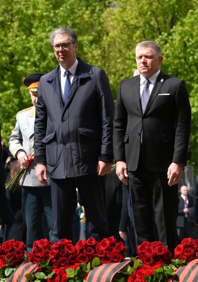 President of Serbia Aleksandar Vucic, left, and Prime Minister of Slovakia Robert Fico at a joint wreath-laying ceremony at the Tomb of the Unknown Soldier in Alexander Garden, Moscow. Russia marks the 80th anniversary of Victory in the Great Patriotic War of 1941-1945. Location: Russia, Moscow. Author: Grigory Sysoev/Sputnik. Wreath-laying ceremony at the Tomb of the Unknown Soldier