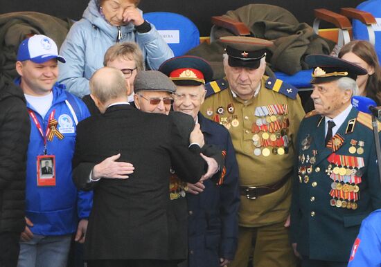 President of Russia Vladimir Putin greets WWII veterans on Red Square in Moscow during the military parade to mark the 80th anniversary of Victory. On May 9, Russia celebrates the 80th anniversary of Victory in the Great Patriotic War of 1941-1945. Location: Russia, Moscow. Author: Alexey Maishev/Sputnik. President of Russia Vladimir Putin and foreign leaders at military parade marking 80th anniversary of Victory