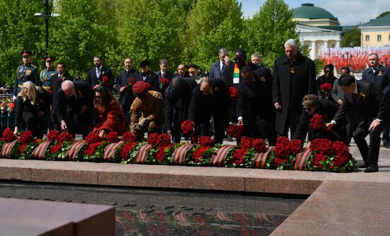 President of Russia Vladimir Putin and foreign leaders at a joint wreath-laying ceremony at the Tomb of the Unknown Soldier in Alexander Garden, Moscow. Russia marks the 80th anniversary of Victory in the Great Patriotic War of 1941-1945. Location: Russia, Moscow. Author: Grigory Sysoev/Sputnik. Wreath-laying ceremony at the Tomb of the Unknown Soldier
