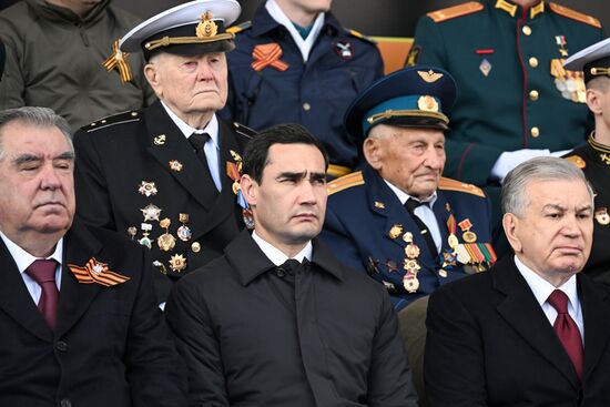 President of Turkmenistan Serdar Berdimuhamedov, center, on Red Square in Moscow during the military parade to mark the 80th anniversary of Victory. On May 9, Russia celebrates the 80th anniversary of Victory in the Great Patriotic War of 1941-1945. Location: Russia, Moscow. Author: Evgeny Biyatov/Sputnik. President of Russia Vladimir Putin and foreign leaders at military parade marking 80th anniversary of Victory