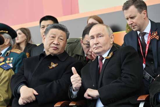 President of Russia Vladimir Putin and Chinese President Xi Jinping on Red Square in Moscow during the military parade to mark the 80th anniversary of Victory. On May 9, Russia celebrates the 80th anniversary of Victory in the Great Patriotic War of 1941-1945. Location: Russia, Moscow. President of Russia Vladimir Putin and foreign leaders at military parade marking 80th anniversary of Victory