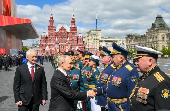 President of Russia Vladimir Putin and Defense Minister Andrei Belousov, left, on Red Square in Moscow, where a military parade marking the 80th anniversary of Victory is taking place. Russia marks the 80th anniversary of Victory in the Great Patriotic War of 1941-1945. Location: Russia, Moscow. Author: Evgeny Biyatov/Sputnik. President of Russia Vladimir Putin and foreign leaders at military parade marking 80th anniversary of Victory