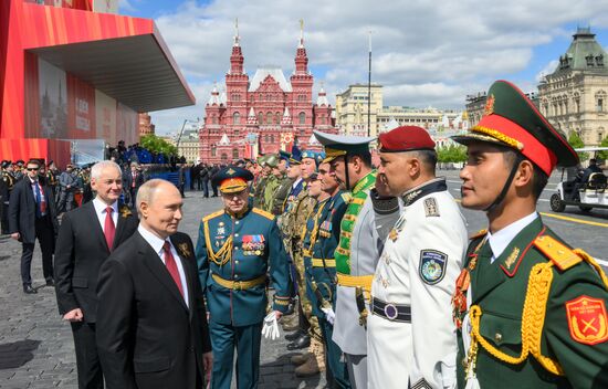 President of Russia Vladimir Putin, Defense Minister Andrei Belousov, left, and Commander-in-Chief of the Army Forces General Oleg Salyukov on Red Square in Moscow, where a military parade marking the 80th anniversary of Victory is taking place. Russia marks the 80th anniversary of Victory in the Great Patriotic War of 1941-1945. Location: Russia, Moscow. Author: Evgeny Biyatov/Sputnik. President of Russia Vladimir Putin and foreign leaders at military parade marking 80th anniversary of Victory