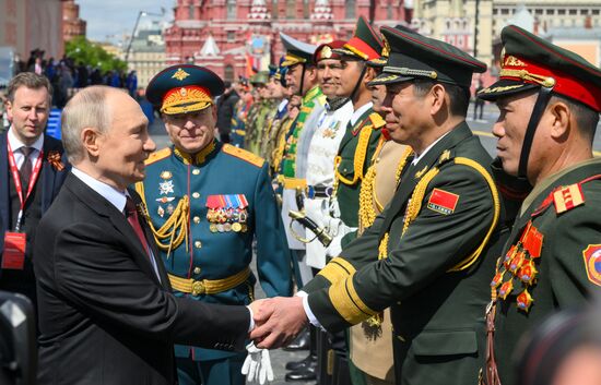 President of Russia Vladimir Putin and foreign leaders at military parade marking 80th anniversary of Victory