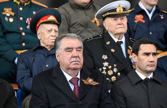 From left, foreground: President of Tajikistan Emomali Rahmon and President of Turkmenistan Serdar Berdimuhamedov on Red Square in Moscow, where a military parade marking the 80th anniversary of Victory is taking place. Russia marks the 80th anniversary of Victory in the Great Patriotic War of 1941-1945. Location: Russia, Moscow. Author: Evgeny Biyatov/Sputnik. President of Russia Vladimir Putin and foreign leaders at military parade marking 80th anniversary of Victory