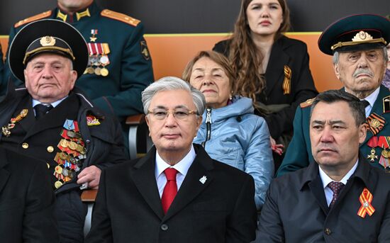 From left, foreground: President of Kazakhstan Kassym-Jomart Tokayev and President of Kyrgyzstan Sadyr Japarov on Red Square in Moscow, where a military parade marking the 80th anniversary of Victory is taking place. Russia marks the 80th anniversary of Victory in the Great Patriotic War of 1941-1945. Location: Russia, Moscow. Author: Evgeny Biyatov/Sputnik. President of Russia Vladimir Putin and foreign leaders at military parade marking 80th anniversary of Victory