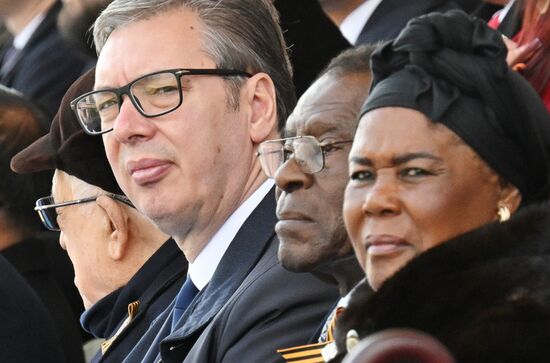 Serbian President Aleksandar Vucic and President of the Republic of Equatorial Guinea Teodoro Obiang Nguema Mbasogo on Red Square in Moscow during the military parade to mark the 80th anniversary of Victory. On May 9, Russia celebrates the 80th anniversary of Victory in the Great Patriotic War of 1941-1945. Location: Russia, Moscow. Author: Ilya Pitalev/Sputnik. President of Russia Vladimir Putin and foreign leaders at military parade marking 80th anniversary of Victory