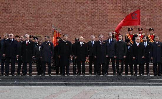 President of Russia Vladimir Putin and foreign leaders at a joint wreath-laying ceremony at the Tomb of the Unknown Soldier in Alexander Garden, Moscow. Russia marks the 80th anniversary of Victory in the Great Patriotic War of 1941-1945. Location: Russia, Moscow. Author: Kirill Zykov/Sputnik. Wreath-laying ceremony at the Tomb of the Unknown Soldier