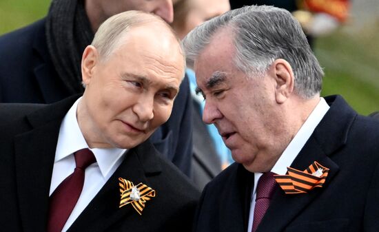 President of Russia Vladimir Putin and President of Tajikistan Emomali Rahmon, right, at a joint wreath-laying ceremony at the Tomb of the Unknown Soldier in Alexander Garden, Moscow. Russia marks the 80th anniversary of Victory in the Great Patriotic War of 1941-1945. Location: Russia, Moscow. Author: Stanislav Krasilnikov/Sputnik. Wreath-laying ceremony at the Tomb of the Unknown Soldier