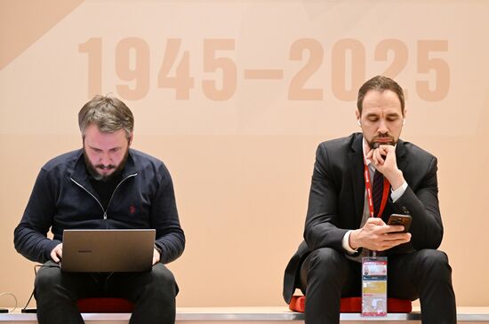 Journalists at the International Press Center covering the 80th anniversary of Victory in the Great Patriotic War. Location: Russia, Moscow. Author: Pelagiya Tikhonova/Sputnik. International Press Center covering 80th anniversary of Victory in Great Patriotic War
