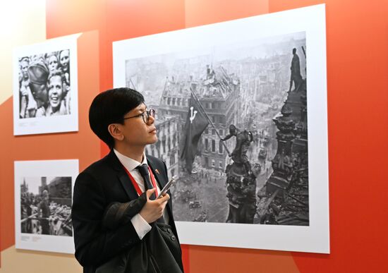 A journalist at the International Press Center covering the 80th anniversary of Victory in the Great Patriotic War. Location: Russia, Moscow. Author: Pelagiya Tikhonova/Sputnik. International Press Center covering 80th anniversary of Victory in Great Patriotic War