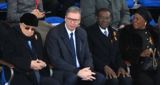 From left: President of Palestine Mahmoud Abbas, President of Serbia Aleksandar Vucic, and President of Equatorial Guinea Teodoro Obiang Nguema Mbasogo on Red Square in Moscow, where a military parade marking the 80th anniversary of Victory is taking place. Russia marks the 80th anniversary of Victory in the Great Patriotic War of 1941-1945. Location: Russia, Moscow. Author: Alexey Maishev/Sputnik. President of Russia Vladimir Putin and foreign leaders at military parade marking 80th anniversary of Victory