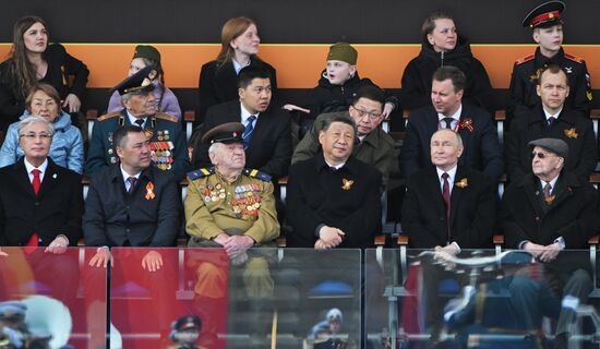 Russian President Vladimir Putin and Chinese President Xi Jinping at the military parade to mark the 80th anniversary of Victory. On May 9, Russia celebrates the 80th anniversary of Victory in the Great Patriotic War of 1941-1945. From left: President of Kazakhstan Kassym-Jomart Tokayev, President of Kyrgyzstan Sadyr Japarov and WWII veteran Yevgeny Znamensky. Right: WWII veteran Ivan Martynushkin. Location: Russia, Moscow. Author: Sergey Guneev/Sputnik. President of Russia Vladimir Putin and foreign leaders at military parade marking 80th anniversary of Victory