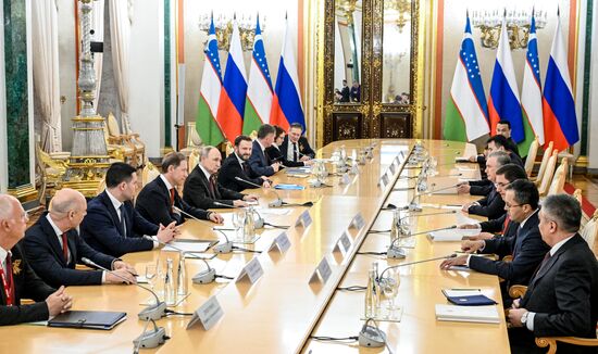 President of Russia Vladimir Putin and President of Uzbekistan Shavkat Mirziyoyev during their meeting. Location: Russia, Moscow. Author: Sergey Bobylev/Sputnik. President of Russia Vladimir Putin's meeting with President of Uzbekistan Shavkat Mirziyoyev