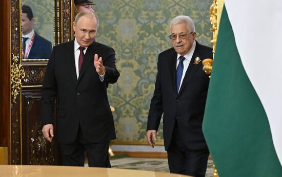 President of Russia Vladimir Putin meets with President of Palestine Mahmoud Abbas
