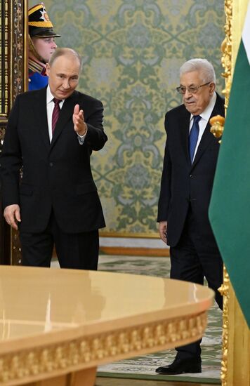 President of Russia Vladimir Putin meets with President of Palestine Mahmoud Abbas