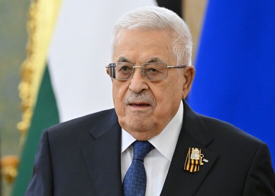 President of Russia Vladimir Putin meets with President of Palestine Mahmoud Abbas