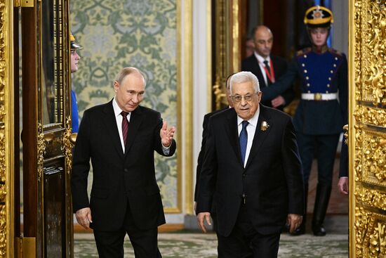 President of Russia Vladimir Putin meets with President of Palestine Mahmoud Abbas