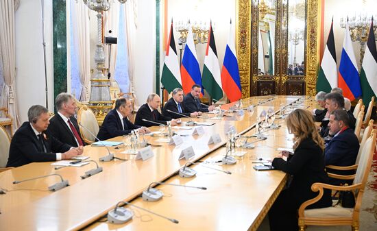 President of Russia Vladimir Putin meets with President of Palestine Mahmoud Abbas