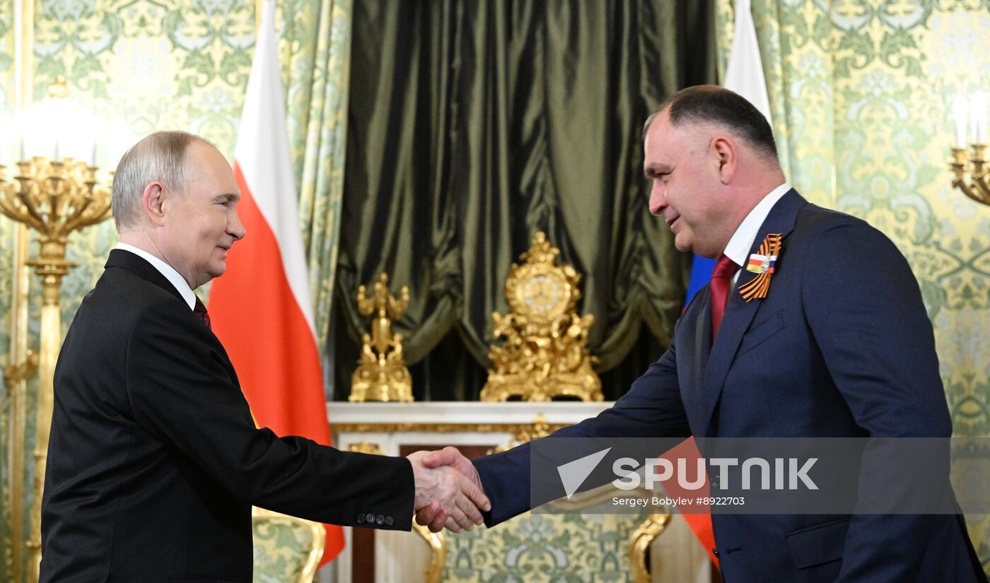 President of Russia Vladimir Putin meets with President of South Ossetia Alan Gagloev