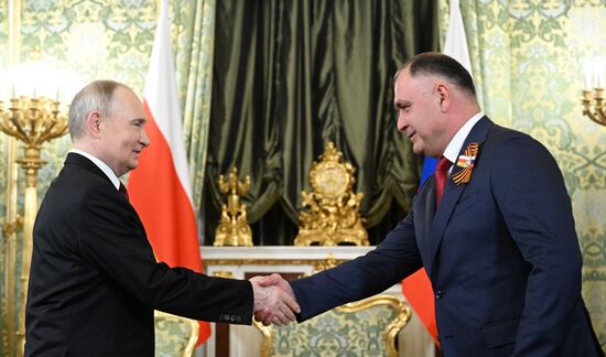 President of Russia Vladimir Putin meets with President of South Ossetia Alan Gagloev