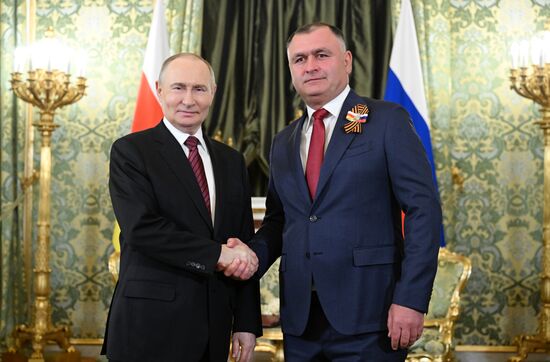 President of Russia Vladimir Putin meets with President of South Ossetia Alan Gagloev