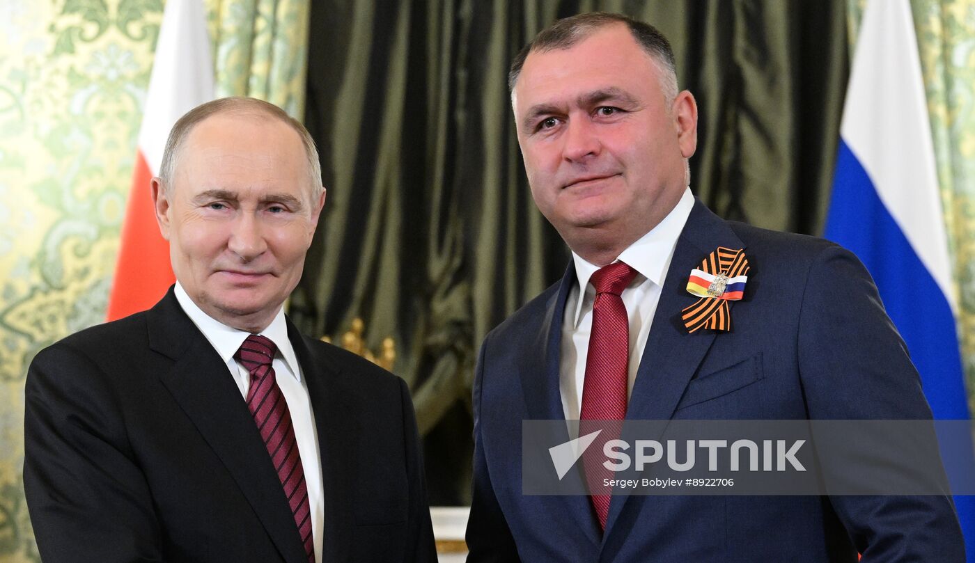 President of Russia Vladimir Putin meets with President of South Ossetia Alan Gagloev