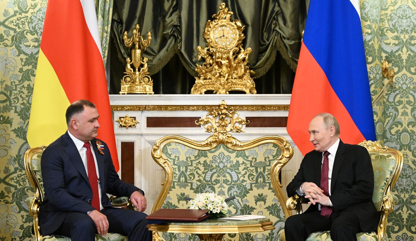 President of Russia Vladimir Putin meets with President of South Ossetia Alan Gagloev