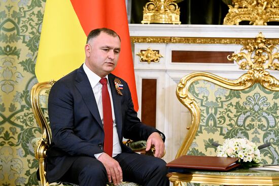 President of Russia Vladimir Putin meets with President of South Ossetia Alan Gagloev