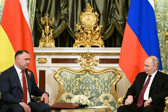President of Russia Vladimir Putin meets with President of South Ossetia Alan Gagloev