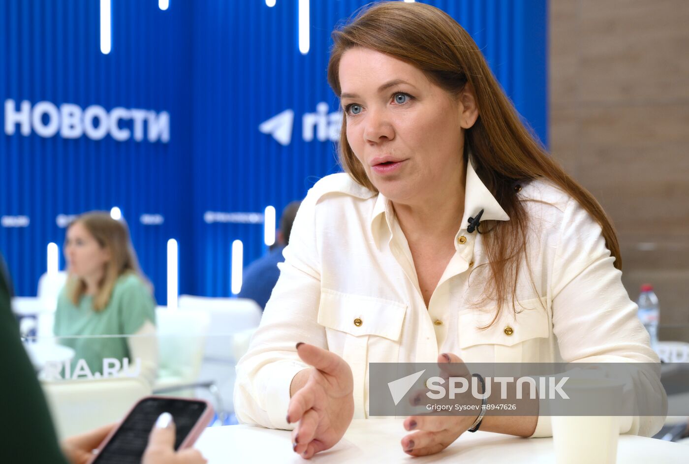 SPIEF-2025. RIA Novosti stand and Sputnik Radio studio