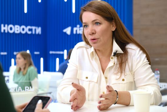 SPIEF-2025. RIA Novosti stand and Sputnik Radio studio