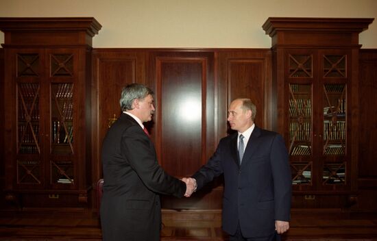 Vladimir Putin and Georgy Poltavchenko at the Kremlin