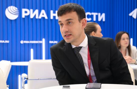 SPIEF-2025. RIA Novosti stand and Sputnik Radio studio