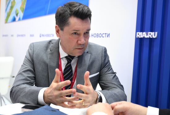 SPIEF-2025. RIA Novosti stand and Sputnik Radio studio